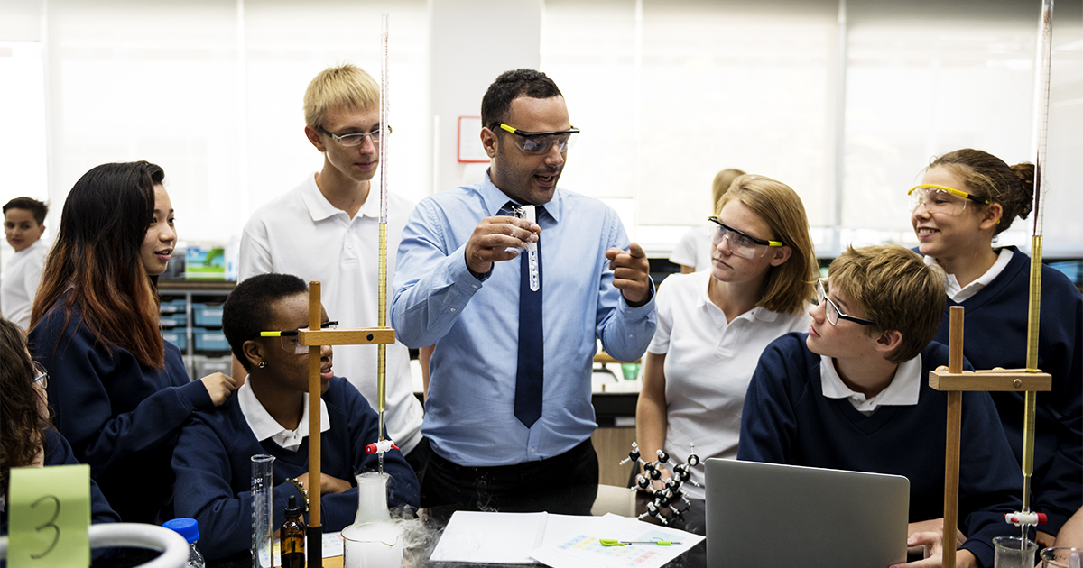 Group of employees listening to a speaker