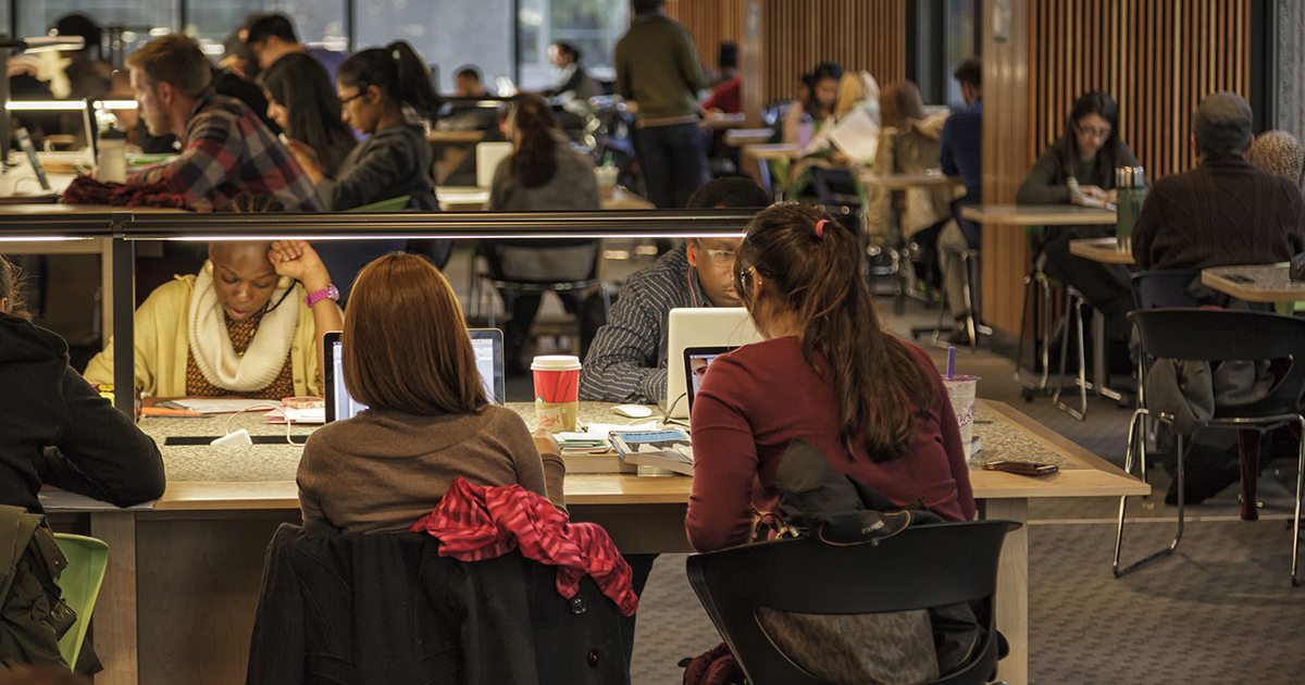 a group of students in college library