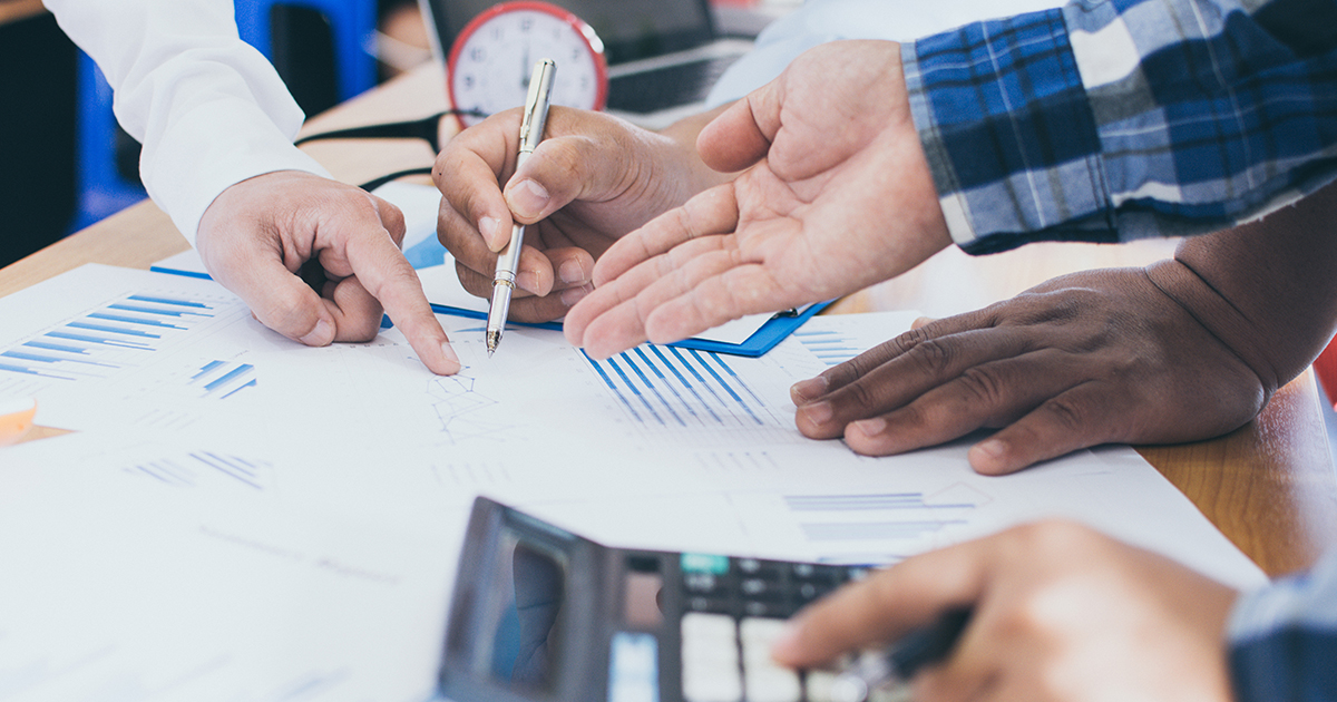 Hands of a diverse group of people having a meeting