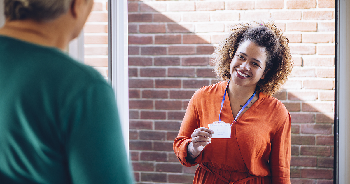 a social worker at the door