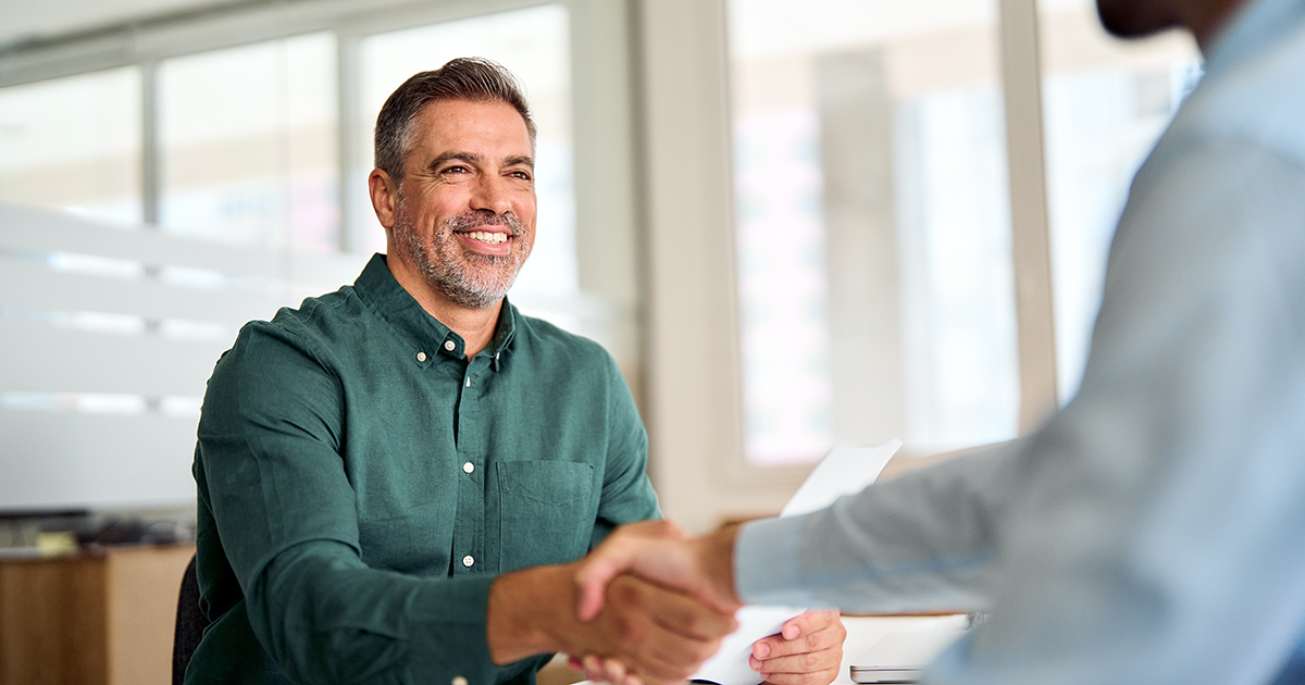 two men shaking hands