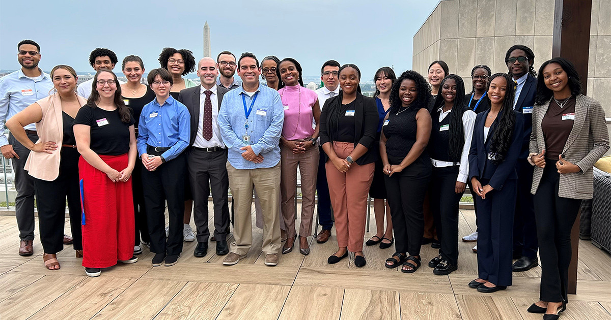 2024 Gueron Scholars with MDRC staff standing outside