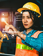 Woman working with robotic arm