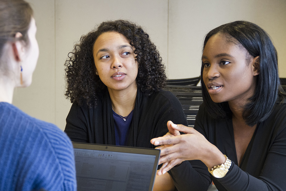 MDRC employees engaged in discussion