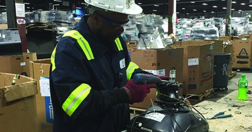 a man working on a factory setting