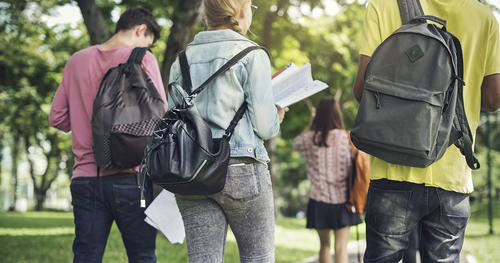 a group of students with backpacks