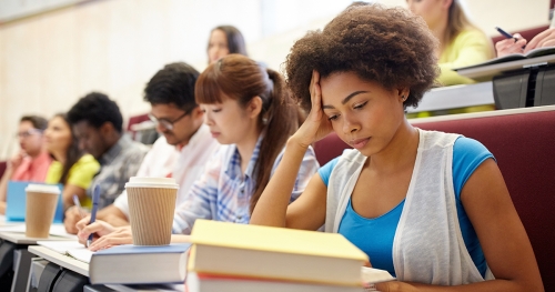 Diverse group of college students in lecture hall