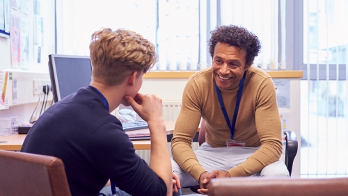 College counselor offering guidance to a student