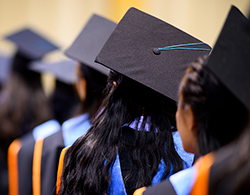 Group of college graduates in line