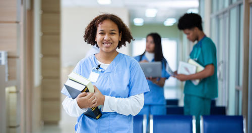 A nurse student with books